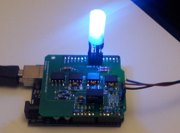 The DMX Shield on top of an Arduino working as an RDM device.