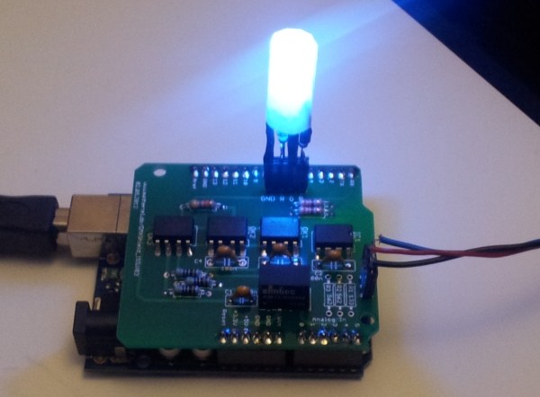 The DMX Shield on top of an Arduino working as an RDM device. The DMX Shield on top of an Arduino working as an RDM device.